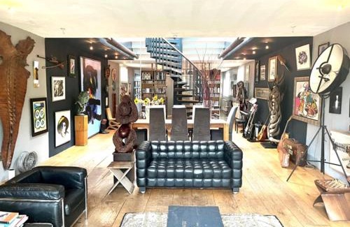 De Weteringschans Appartement | Elegant penthouse LOFT of 250 m2 in city centre with huge roofgarden 80 m2