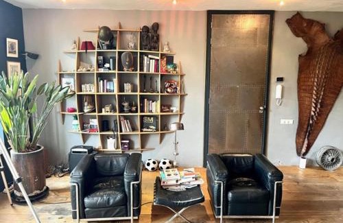 De Weteringschans Appartement | Elegant penthouse LOFT of 250 m2 in city centre with huge roofgarden 80 m2
