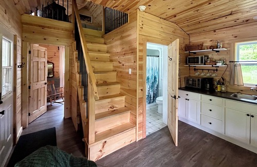 Canterbury Cabine | Elevated cabin nestled among the trees, and the Saint John River. Pet friendly.