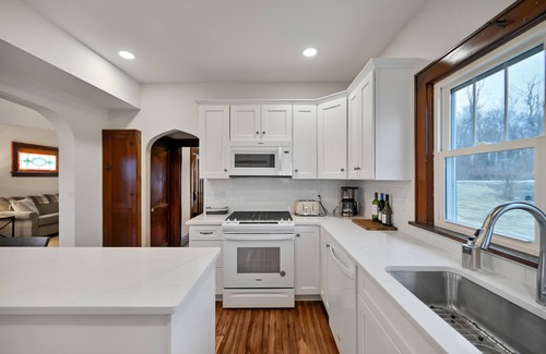 Orson Autre | Elk Mountain-Belmont Lake Restored Farmhouse on 300 Acres in Pleasant Mount, PA