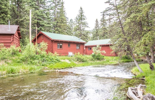 Cheyenne Crossing Cabine | Elkhorn Cabine avec Porche de couchage