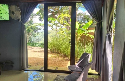 Monteverde Maison | Encantadora villa con vista al atardecer y al valle.