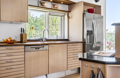 Daugard Maison | Enjoy a relaxing holiday in this holiday home with sea views near Vejle Fjord.