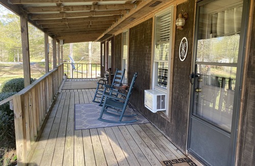 Gordo Cabine | Enjoy our stocked lake and 28 miles to The University of Alabama for football!