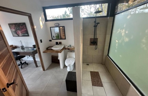 Santa Cruz Maison | Enjoy privacy and nature in this open concept home and relaxing pool.