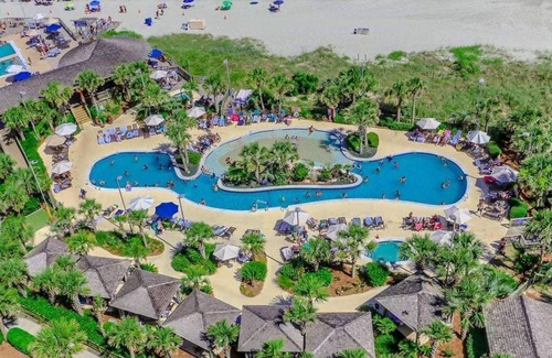 Arcadian Shores Copropriété | Enjoy the beach and golf