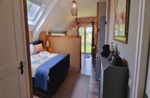 Bantega Lit Et Petit-Déjeuner | Enjoy the tranquility of the Frisian countryside at Sleeping at Bonanza
