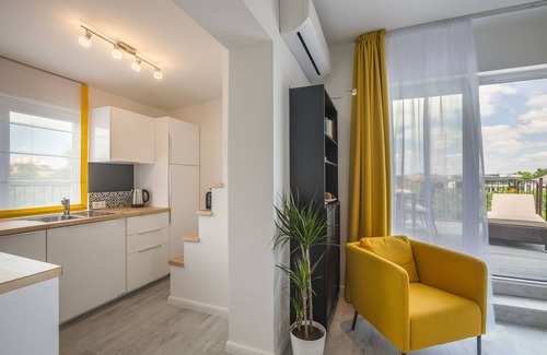 Istvanmezo Appartement | Profitez de votre terrasse privée près de City Park!