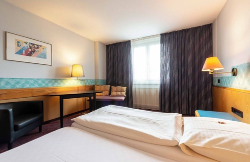 Korntal-Munchigan Lit Et Petit-Déjeuner | enjoyHotel garni Korntal Stuttgart