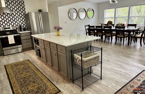 Oskaloosa Maison | Entertain Large Groups Here: Game Room, Pool, Patio, Fire Pit, Pool Table & More