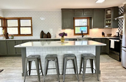 Oskaloosa Maison | Entertain Large Groups Here: Game Room, Pool, Patio, Fire Pit, Pool Table & More