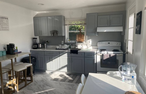 Garden City Park Maison | Entire 3bdr home w/parking, backyard, FirePit, BBQ