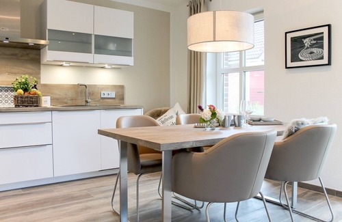 Greetsiel Appartement | Entspannung Pur: Moderne Ferienwohnung 'viel Meer' mit Sauna und Garten