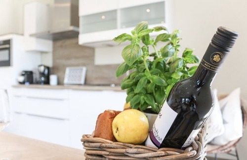 Greetsiel Appartement | Entspannung Pur: Moderne Ferienwohnung 'viel Meer' mit Sauna und Garten