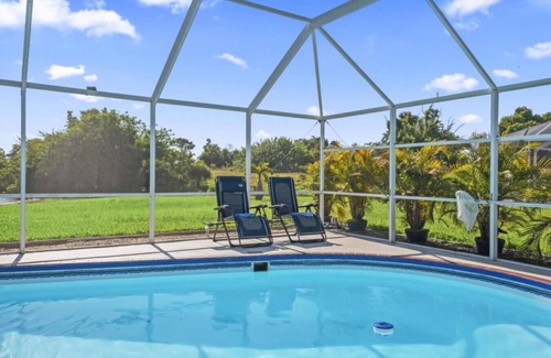 Caloosahatchee Maison | Escape to this charming 3-bedroom house in Cape Coral