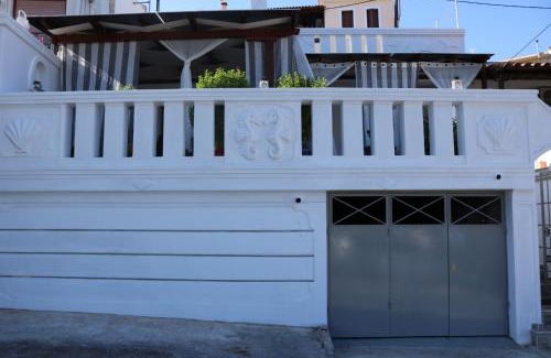 Votsi Maison | Evilio