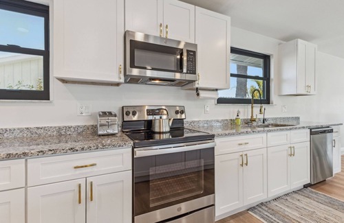 Yacht Haven Maison | Exclusive Coastal Retreat: Discover Serenity - Your Ideal VRBO Getaway
