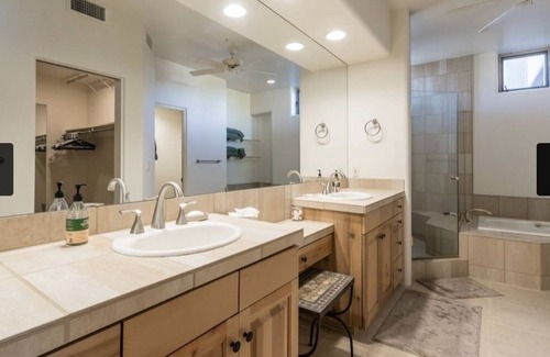 Desert Mountain Maison | Exclusive Desert Mountain, Scottsdale Double Master Suite with fireplace.