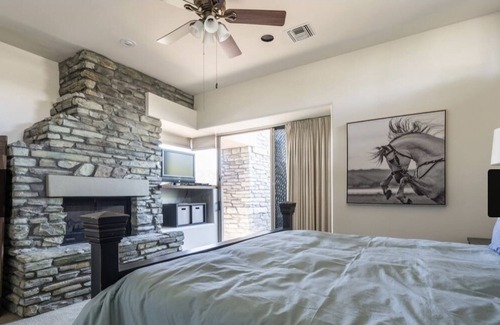 Desert Mountain Maison | Exclusive Desert Mountain, Scottsdale Double Master Suite with fireplace.