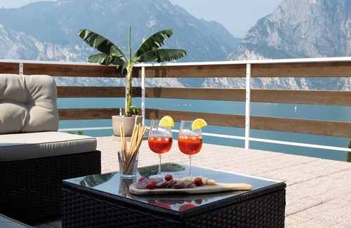 Torbole sul Garda Appartement | Exclusive residence in Torbole with breathtaking views, large terrace.
