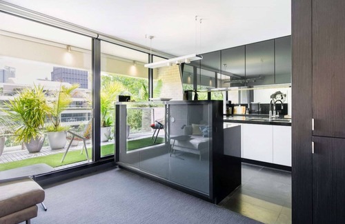 Darlinghurst Appartement | Executive townhouse in garden oasis complex with pool