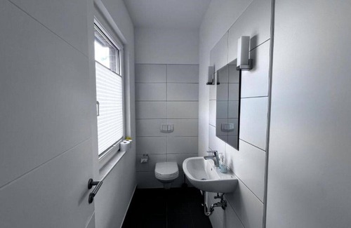 Eilsum Appartement | Exklusiver Platztraum, Sonnengeflutet, mit Weitblick Garten, Südbalkon/terrasse