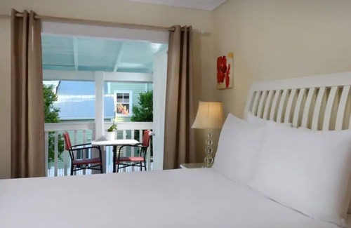 Uptown - Upper Duval Maison | Experience All Of What Key West Has To Offer! Beach Access, 3 Pools, Bar!