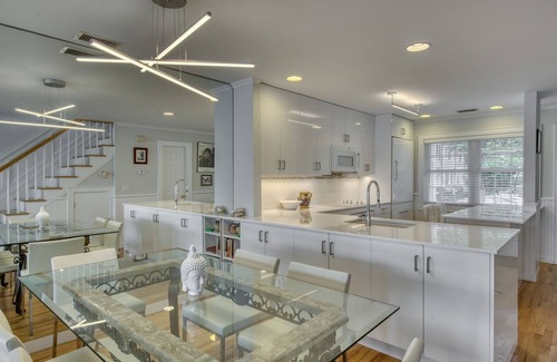 Greenport Maison | Exquisite Waterfront Townhome in Greenport with Pool and Boat Slip. Walk to all!
