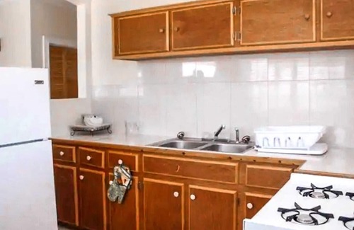 Rolleville Maison | Exuma Point Villas -Swimming Pigs Resort- Green Lignam Vitae