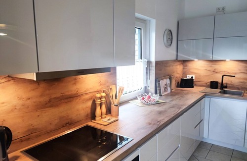 Lietzow Appartement | F-1064 Rhododendronblüte - Ferienwohnung Rhododendronblüte F-1064 Wohnung 01