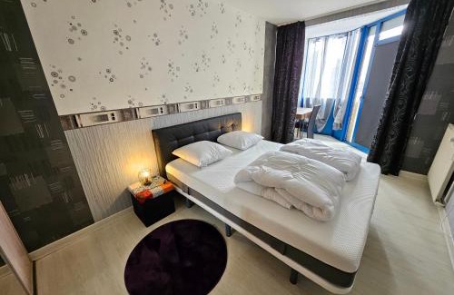 Hericourt Appartement | F3 rez-de-chaussée Centre ville au calme avec Balcon Garage et Netflix