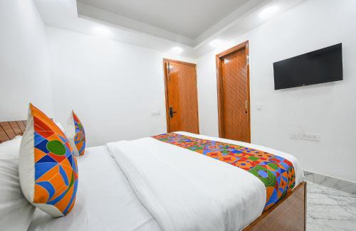 Sainik Farm Hôtel | FabExpress The Cozy Cloud