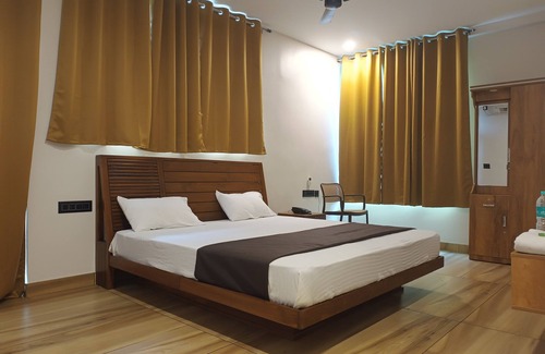 Takkalai Hôtel | Falls Regency