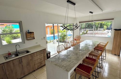 Parrita Maison | Family-Friendly 4BR Oasis with A/C & Pool near Playa Bandera