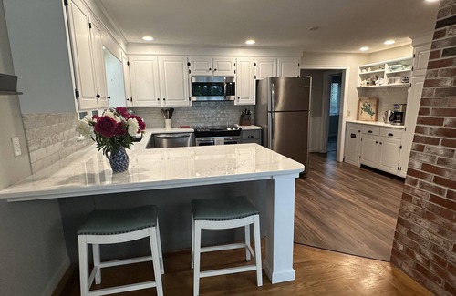 Wolfeboro Maison | Family Friendly house with lakefront views surrounded by trees