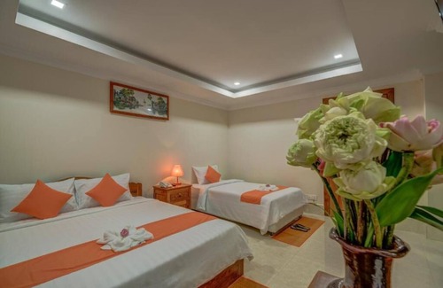 Siem Reap Station Balnéaire | Chambre familiale: 1 lit double et lit simple