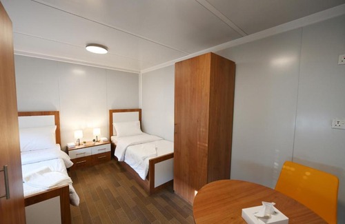 Doha Lit Et Petit-Déjeuner | Fan Village Cabins Free Zone