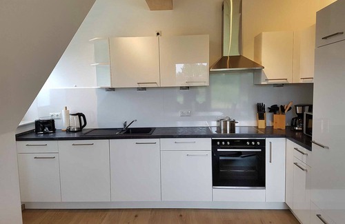 Dranske Appartement | Fantastic vacation apartment with underfloor heating, fireplace, WLAN