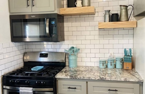 Great Bend Maison | Farmhouse - Centrally Located in Great Bend, Gas Firepit and Pet Friendly Yard