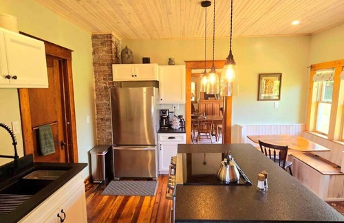 Romney Maison | New Listing! Farmhouse along River Rd. with idyllic views and country charm