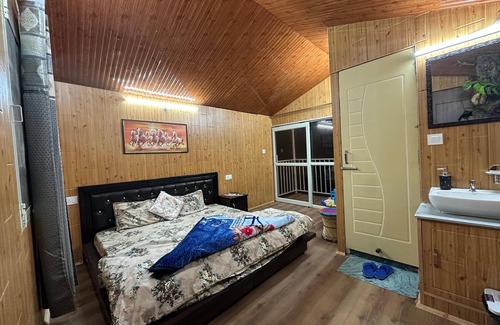 Shimla Autre | farmhouse & treehouse surrounded with orchids with mountain valley and city view