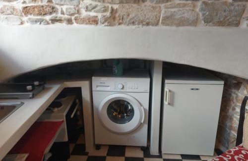 Filoti Maison | Fasolas square studio 15m2 is located 30 stairs up from the main road and it is in the old market fasolas and next to the museums