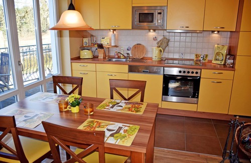 Rugen Island Appartement | Ferienappartement Sonnenstrahl avec sauna et balcon - appartements de manoir avec cheminée, sauna et