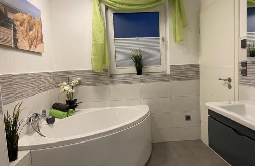 Walkenried Maison | Ferienhaus BellaVita - mit großem eingezäuntem Garten - Infrarotsauna - 3 Hunde willkommen - Badesee 800m entfernt