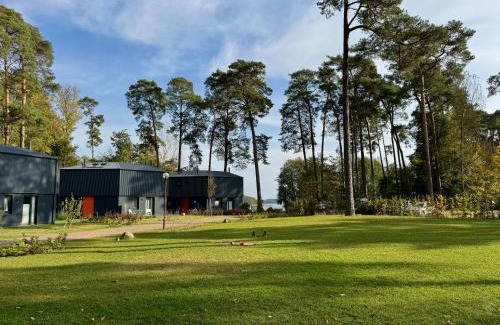 Postheim Maison | Ferienhaus Haus 11 in Templin mit Seeblick und Sauna