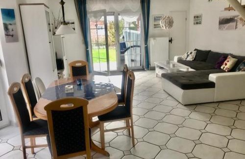 Neßmersiel Maison | Ferienhaus Huus Wattenmeer in Nessmersiel mit Garten, Terrasse, Sauna, Räder, und Grill