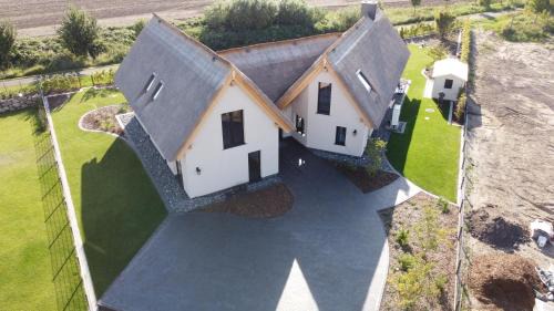 Puddemin Maison | Ferienhaus Inselglück in der Puddeminer Wiek