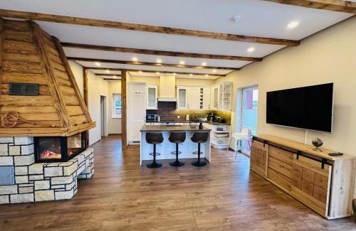 Dolgen am See Maison | Ferienhaus MILA - Pool, Sauna, Whirlwanne, 5000qm Privatgelände mit Bolzplatz