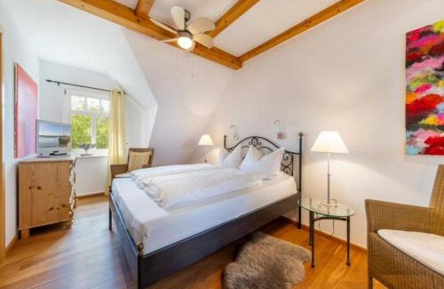 Zudar Maison | Ferienhaus Rügenbrise mit Seeblick direkt am Wasser