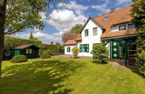 Zudar Maison | Ferienhaus-Ruegenbrise-mit-Seeblick-direkt-am-Wasser